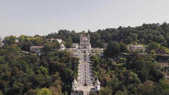 Gorgeous baroque stairway to the Sanctuary of Bom Jesus do Monte, Braga. Aerial dolly out alt