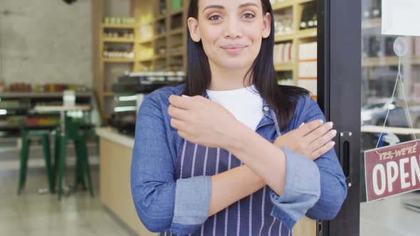 Animation of happy biracial waitress at coffee shop alt
