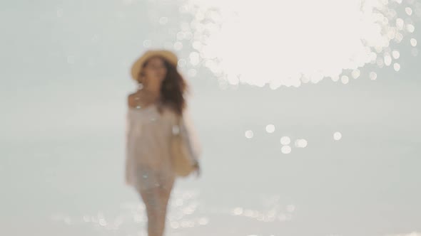 Woman Resting on the Beach During Vacation alt