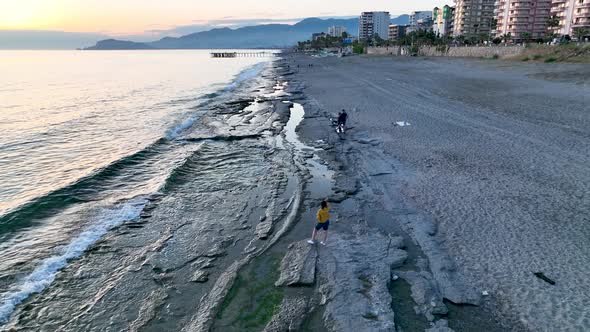 Texture of the rocky beach aerial view 4 K Turkey Alanya alt