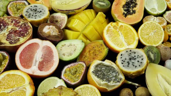 Rotation Of Sweet Exotic And Tropical Fruits Cut.