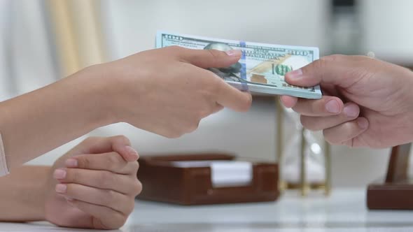 Man Giving Woman Dollar Cash, Payment for Service, Business Deal, Contract alt