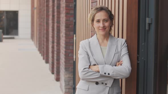 Portrait of Confident Business Woman Outdoors alt