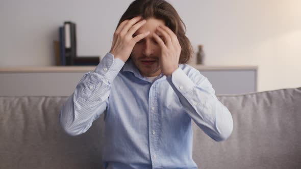 Emotional Man Talking to Camera Complaining About His Life Feeling Stressed and Desperate Sitting on alt