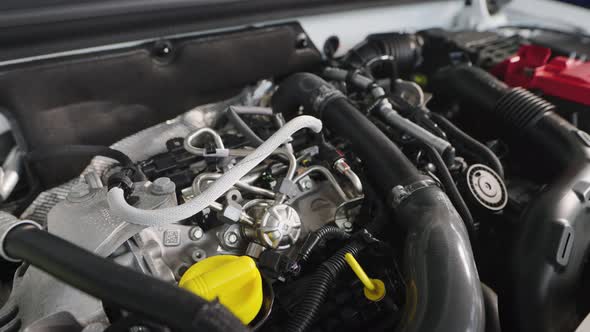 Car Engine Under the Hood of a Modern Car alt