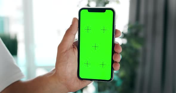 Chromakey Smartphone in Hands Indoors