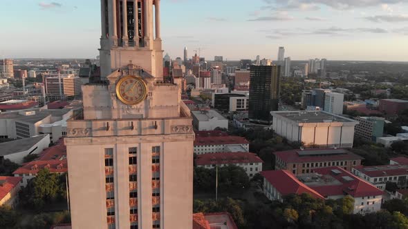 Very dynamic shot of the UT tower. 3 axis motion as the drone does a flyby to reveal downtown Austin alt