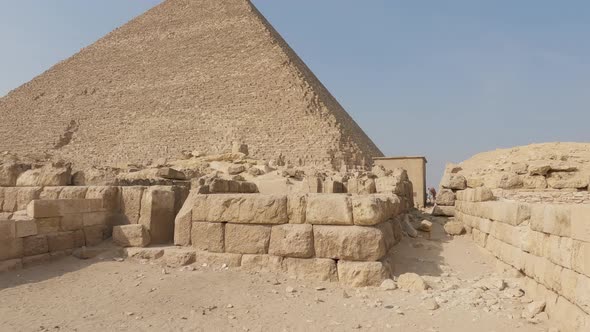 Sand blocks in front of the Pyramid of Khufu, at the Giza pyramid complex, in sunny Egypt, Africa - alt