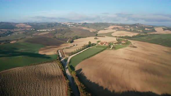 Aerial View of the Fields, Wineries Near San Quirico d'Orcia. Tuscany Autumn Sunrise