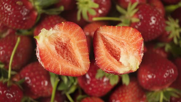 Sliced Strawberry On The Background Of A Rotating Berry.
