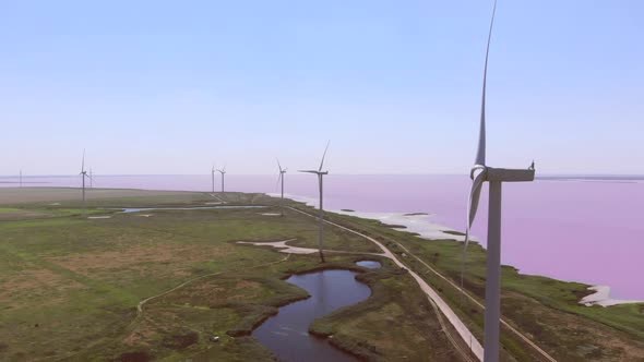 Large Grey Blades Rotate on Energy Generators on Wind Farm