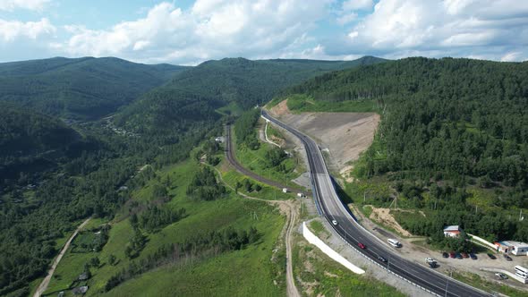 The Baikal Serpentine Road Aerial View of Natural Mountain Valley with Serpantine Road TransSiberian alt