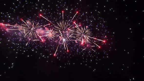 Long Time Seamless Loop of Real Colourful Fireworks Festival in Sky Display at Night During National alt