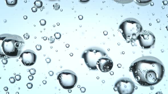 Super Slow Motion Macro Shot of Rising Various Bubbles in Water at 1000 Fps alt