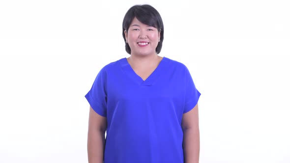 Happy Overweight Asian Businesswoman Smiling alt