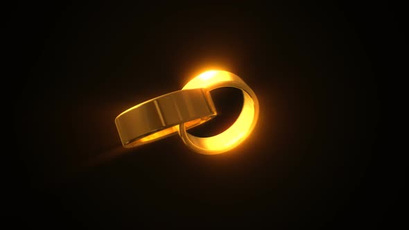 Interlocked two gold wedding rings. A precious symbol of eternal love. alt
