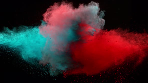 Super Slowmotion Shot of Color Powder Explosion Isolated on Black Background alt