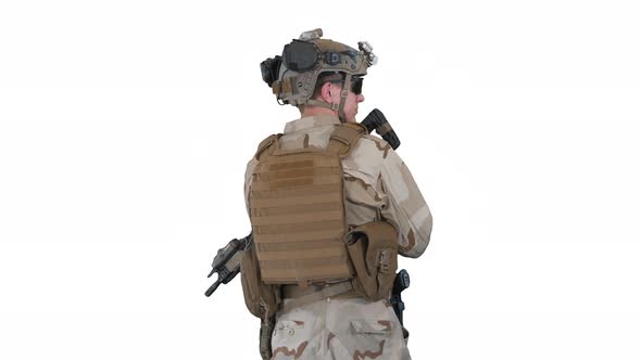 Fully Equipped Solder Holding Assault Rifle and Standing Looking to the Sides on White Background