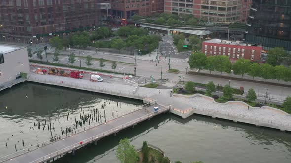 An aerial view over Manhattan's Little Island, a public green space taken on a sunny morning. The ca alt