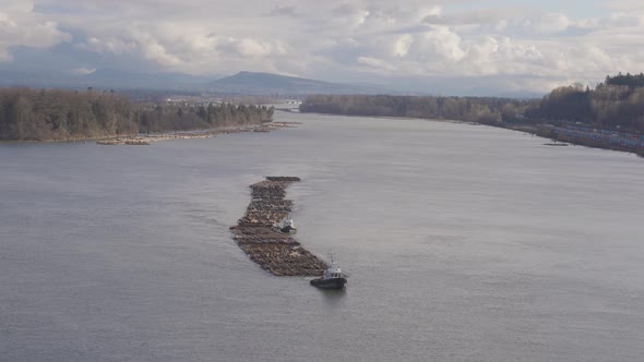 Logs Pulled By a Tugboat on Fraser River alt