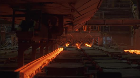 Steel Mill Steel Bars and Pipe Production Redhot Pipes Transported on Production Line Heavy Industry alt