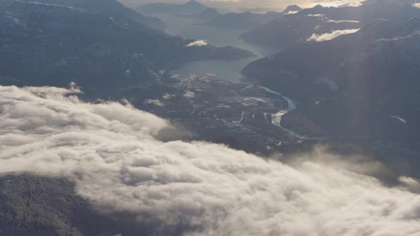 Aerial View of a Small City Squamish in Howe Sound During Winter Season alt