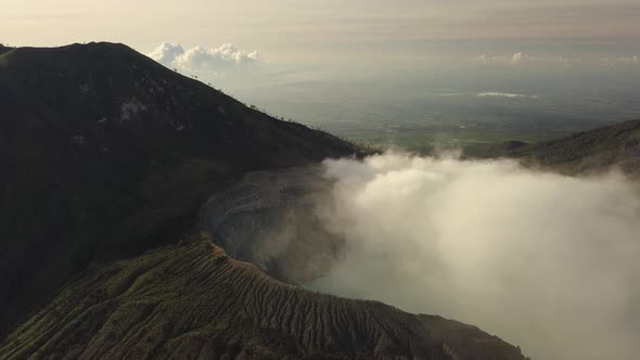 Aerial Shot of Active Volcano Crater. Sunrise Indonesia.