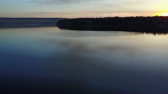 Beautiful River At Sunset. View of the forest with river at sunset alt