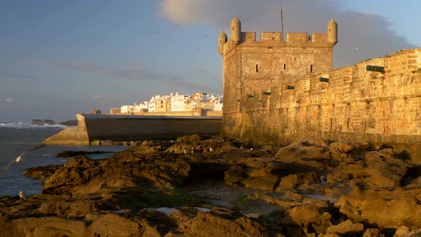 Essaouira, Morocco. The Genoese-built Citadel Du Port on Sunset alt