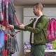 Man is Choosing Goods in Store with Automobile Accessories - VideoHive Item for Sale