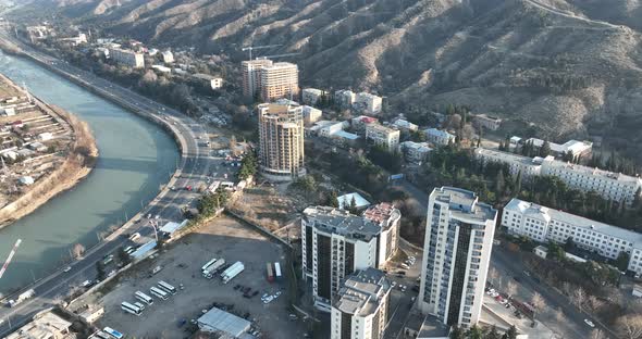 Aerial view of Ortachala district at sunset. cityscape over Kura river in Tbilisi, Georgia 2022 alt