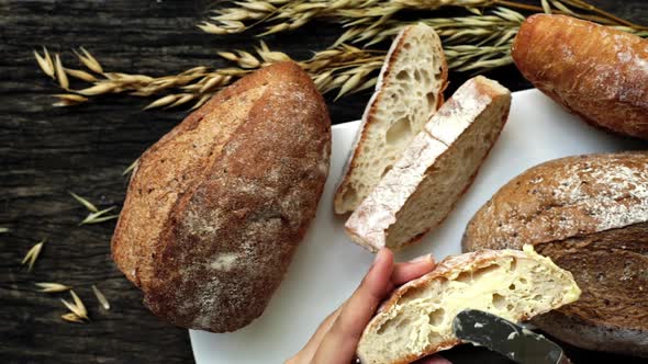 A closeup top view of freshly baked traditional Italian Ciabatta breads prepared and cut in to slice alt