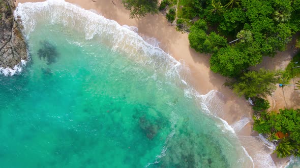 Aerial view over white beach sand and sew water clear. Nature view tropical beach Phuket, Thailand. alt