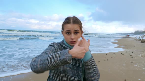 A Woman Performing Dance Improvisation at the Seacoast alt