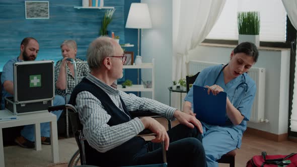 Elder Patient Talking to Nurse for Healthcare Consultation alt