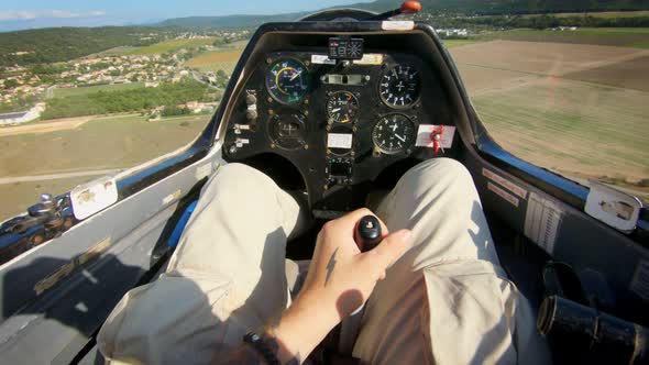 POV of Pilot Flying Small Private Jet or Glider