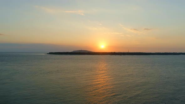 Rising Aerial View of the Gili Isles at Sunset alt