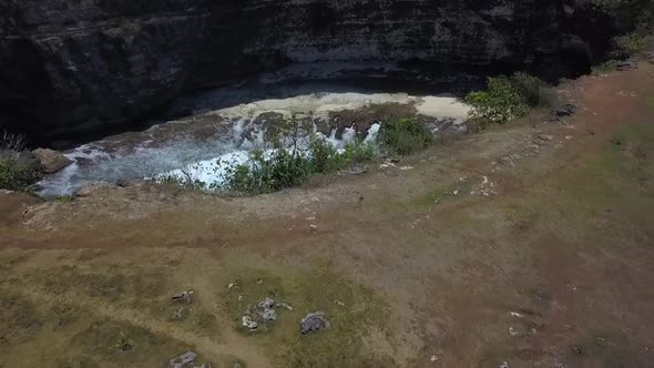 Dramatic aerial view flight drone camera pointing down shotBroken Beach at Nusa Penida Bali Indones alt