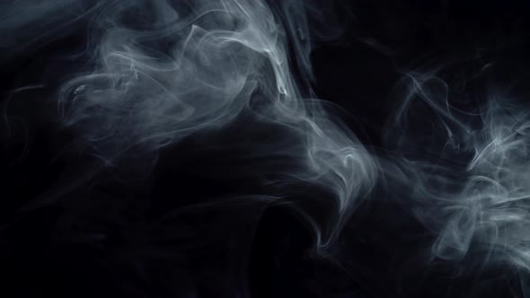 Smoke Vape Cloud Swirl and Disappear on Black Background