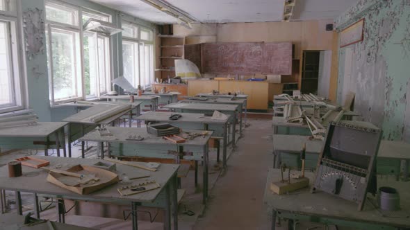 Pripyat School Abandoned Classroom During The Chernobyl Nuclear Disaster In Ukraine - Medium shot alt