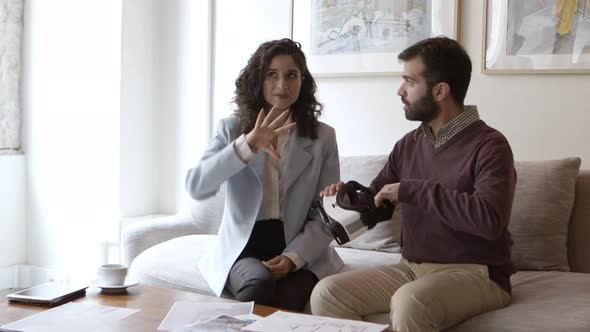 Bearded Young Man Looking at Interior Design Via VR Technology  alt