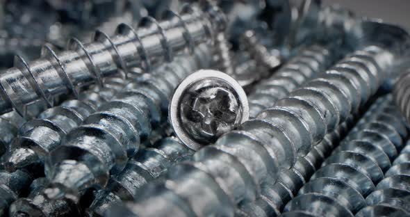 Super Macro Close Up Screws Bolts Nut and Bolt Parts Metal Springs Fasteners in a Heap alt