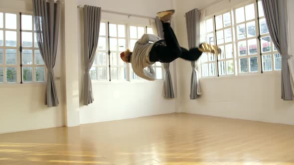 Young Asian Male Breakdancer Dancing alt