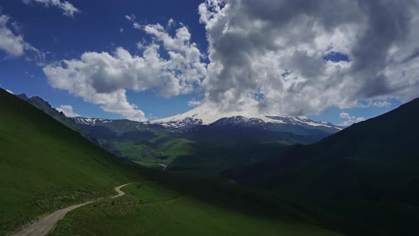 Mount Elbrus and Clouds Caucasus Mountains alt