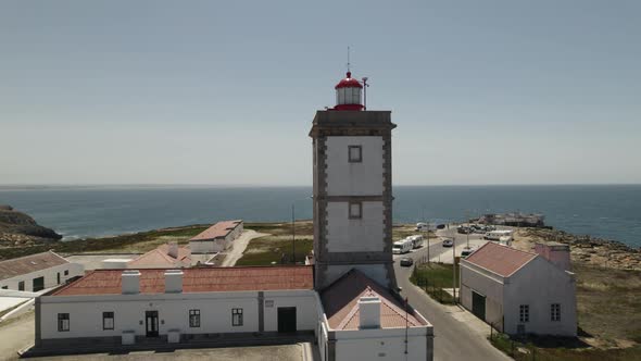 Aerial orbiting around Peniche lighthouse and Cabo Carvoeiro in Portugal