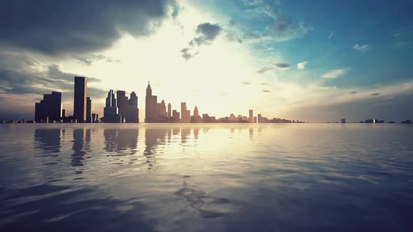 Skyline with Skyscrapers and Sea at Sunset alt
