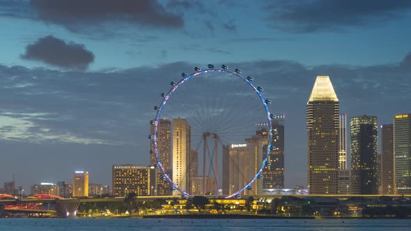 Singapore Ferris Wheel and business district and city,