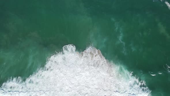 Drone Flying Above Rolling Waves in the Ocean
