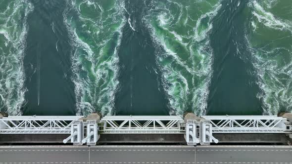 Sea Water Passing Through a Storm Barrier Bridge alt