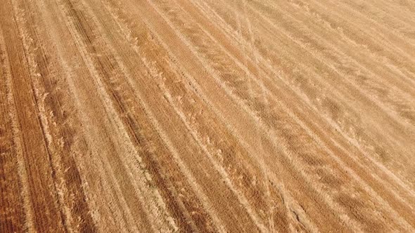 Aerial drone view of a flying over the rural agricultural landscape. alt